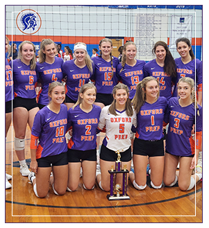 Girls volleyball team with their trophy
