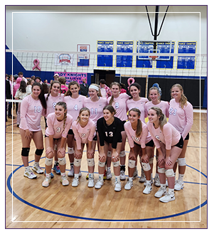 Girls volleyball team in pink